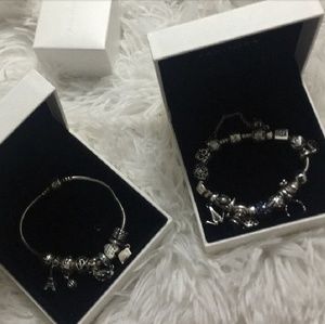 Only the cross and "you're so loved" charms